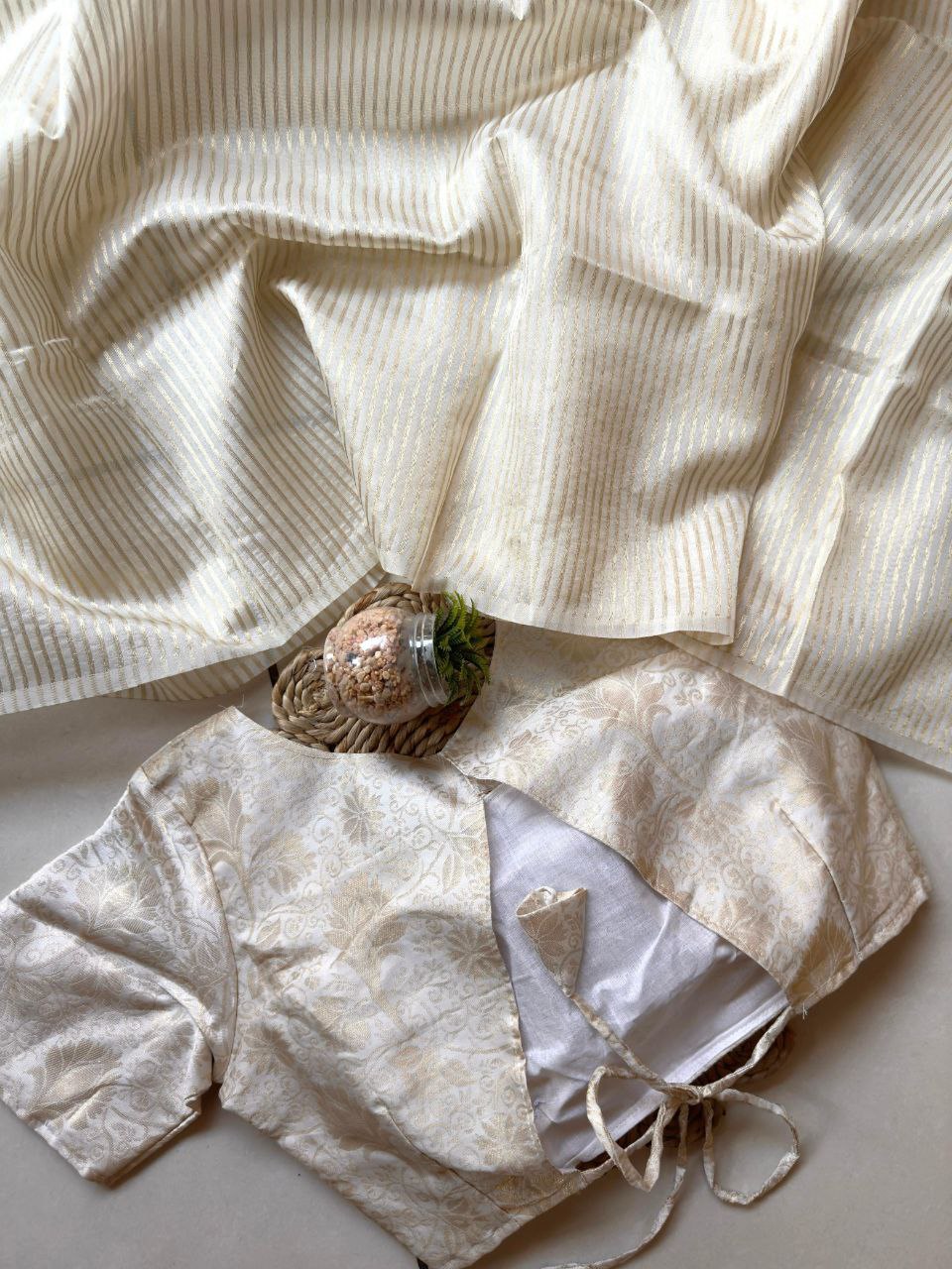White Organza Saree with Golden Zari Stripes and Brocade Jacquard Blouse