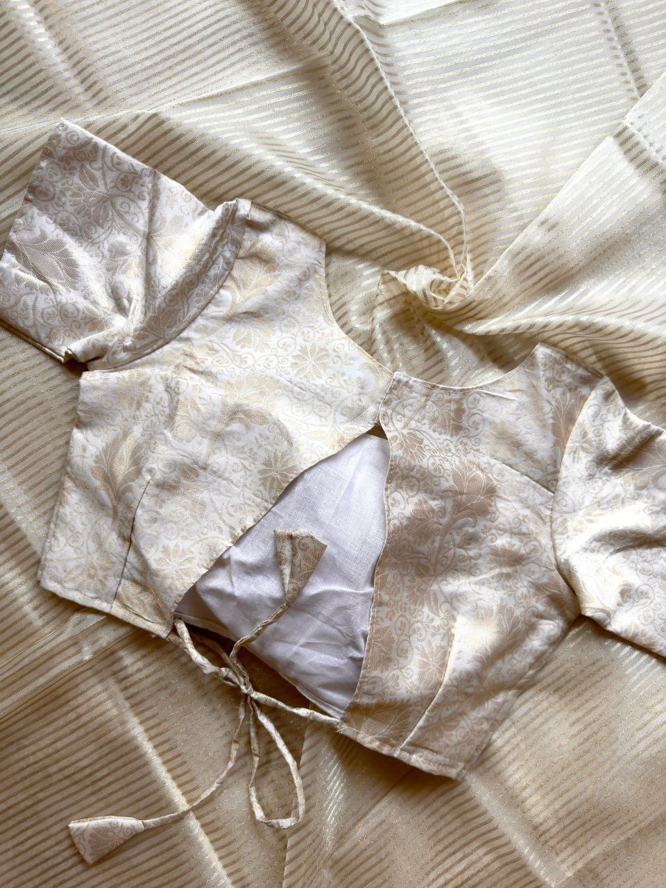 White Organza Saree with Golden Zari Stripes and Brocade Jacquard Blouse